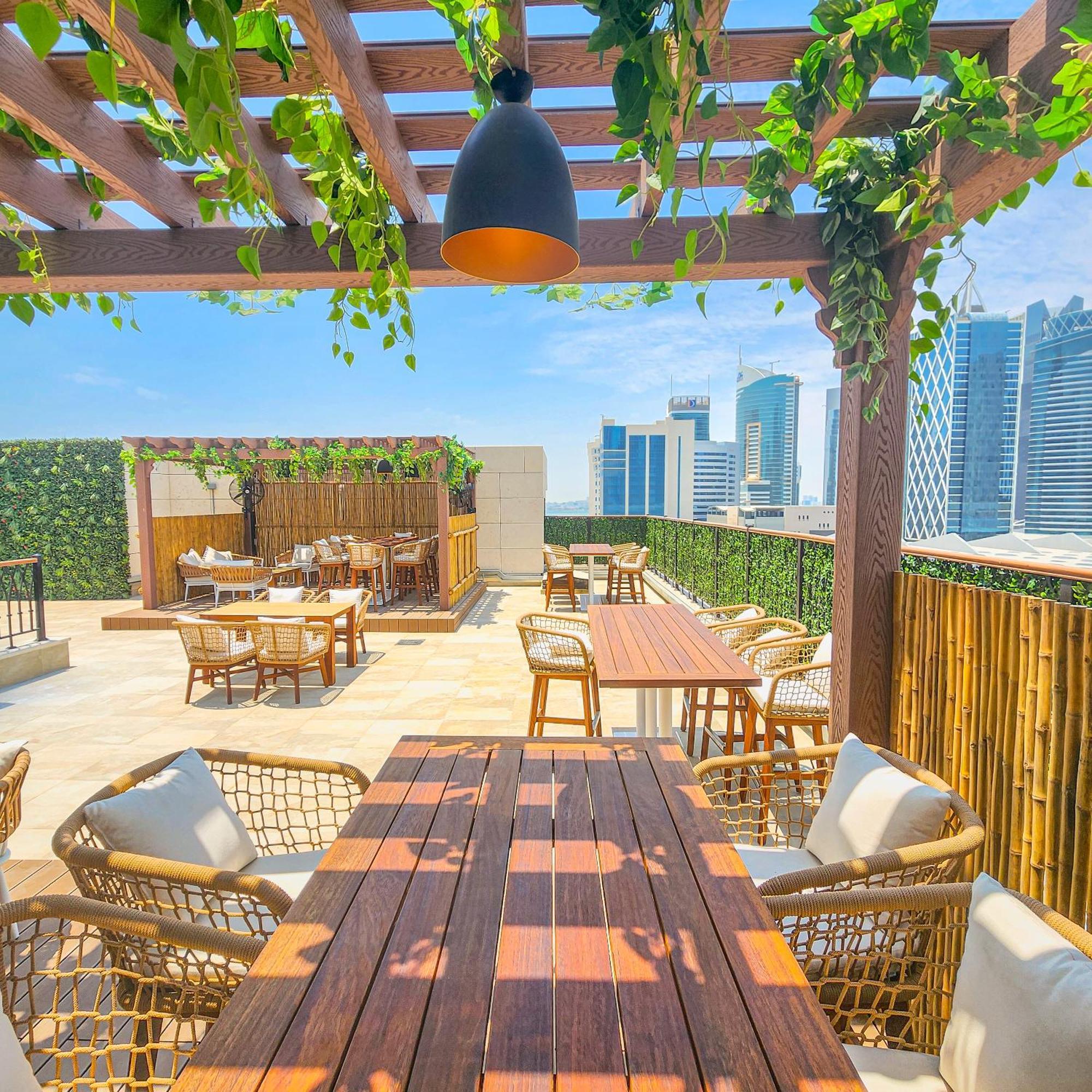 City Centre Rotana Доха Екстер'єр фото The rooftop bar at the hotel